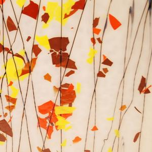 Bullseye Fracture Streamer Orange, Yellow & Red With Black On White (autumn) Glass